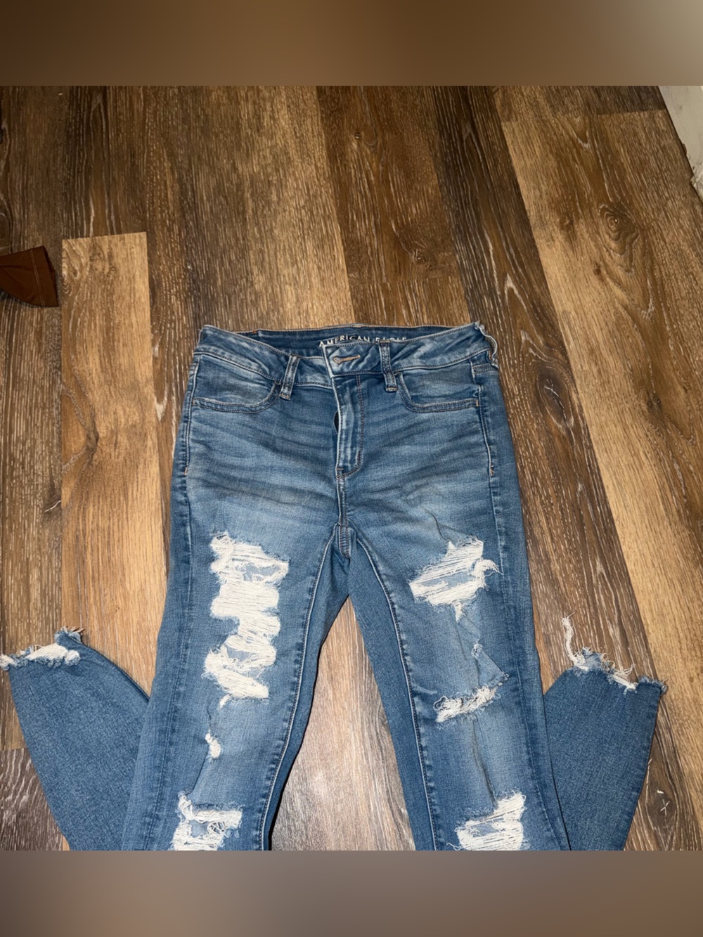 American Eagle Outfitters distressed light blue skinny jeans
